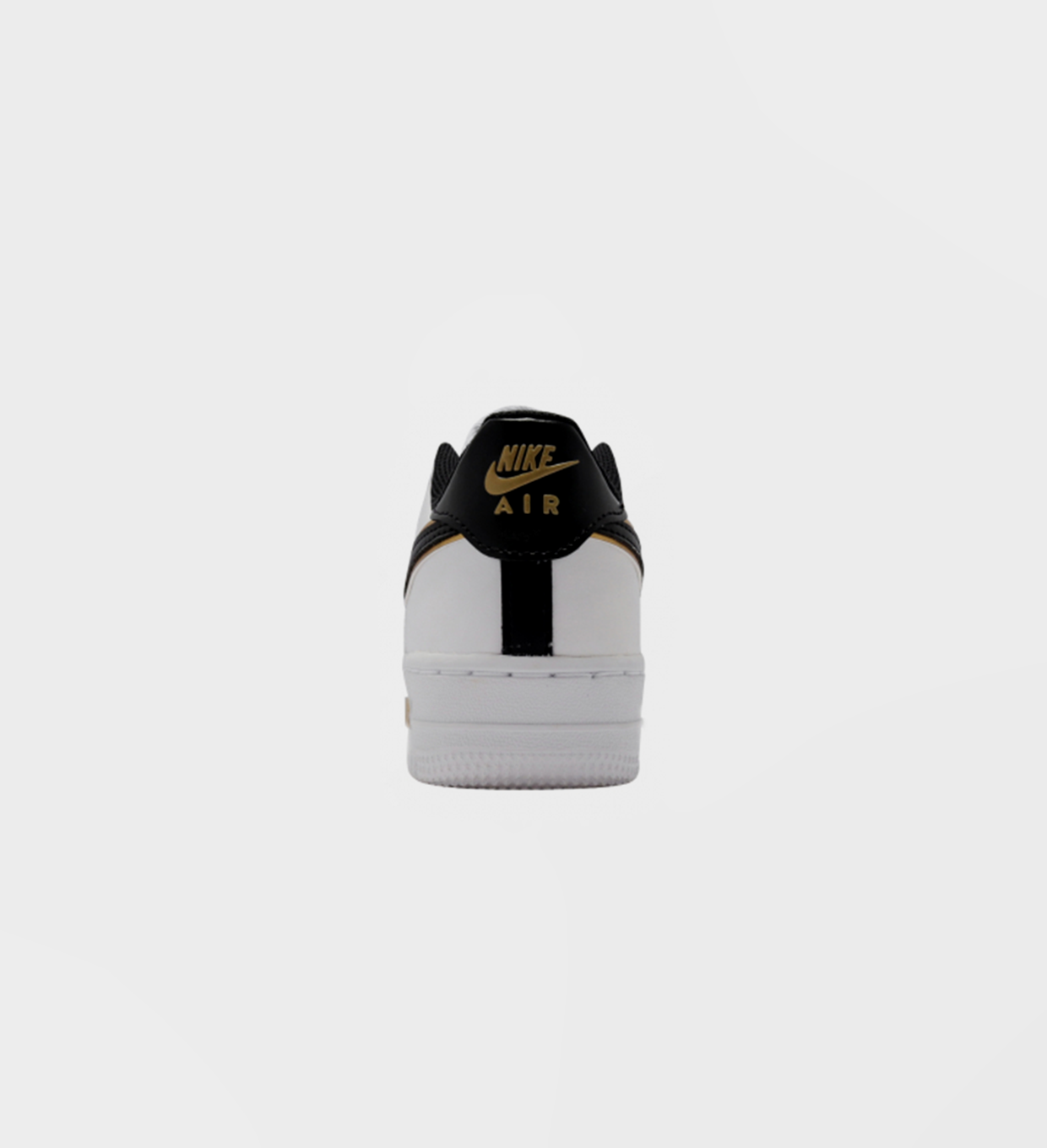 nike black gold white shoes